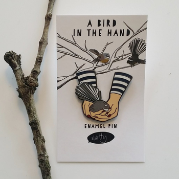 A Bird in the Hand Enamel Pin