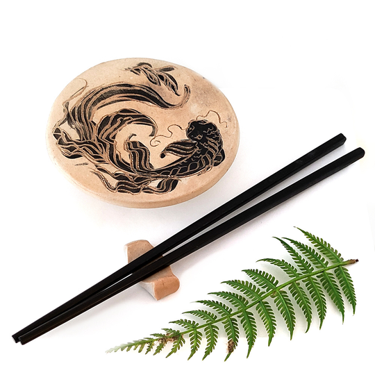 Large Fish Dish with Chopsticks and Holder