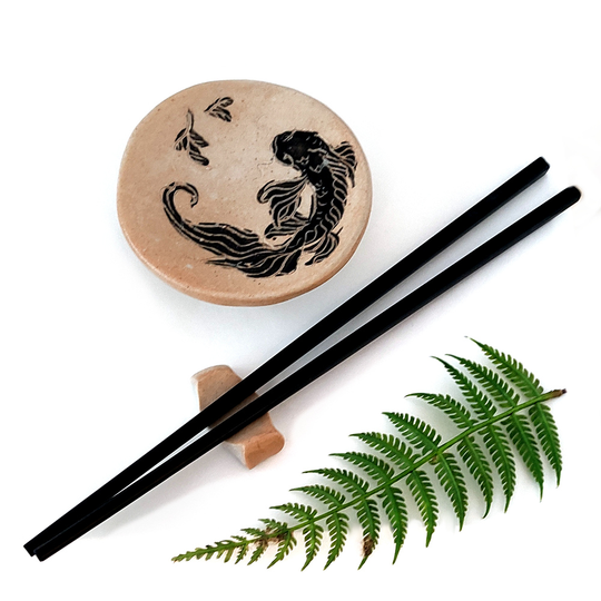 Small Fish Dish with Chopsticks and Holder