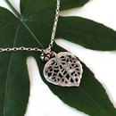 Small Kawakawa Necklace Silver with Garnet
