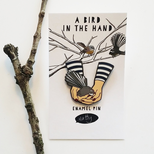 A Bird in the Hand Enamel Pin