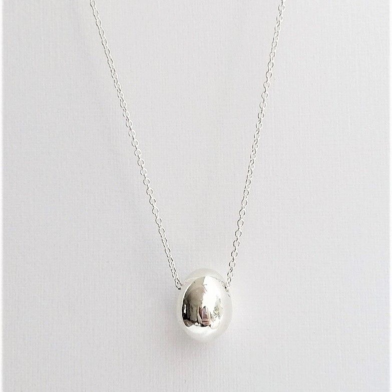 Silver on sale egg pendant